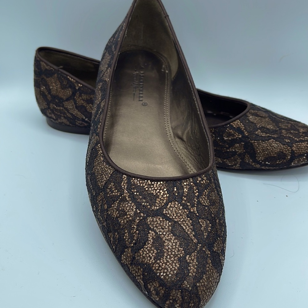 Metallic copper and black color slip on shoes